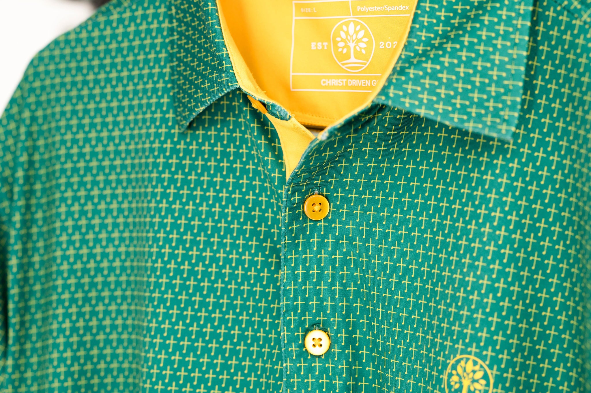 Moisture-Wicking Green Golf Polo with Subtle Cross Design